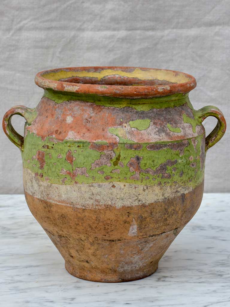 Rustic antique French confit pot with pale green glaze