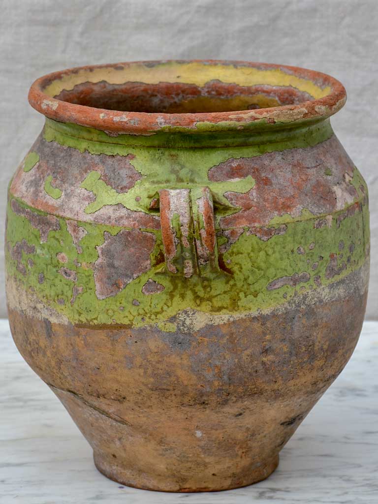 Rustic antique French confit pot with pale green glaze