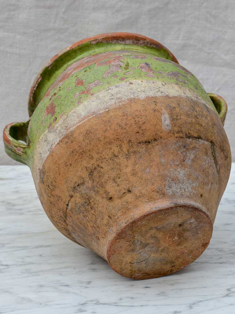 Rustic antique French confit pot with pale green glaze