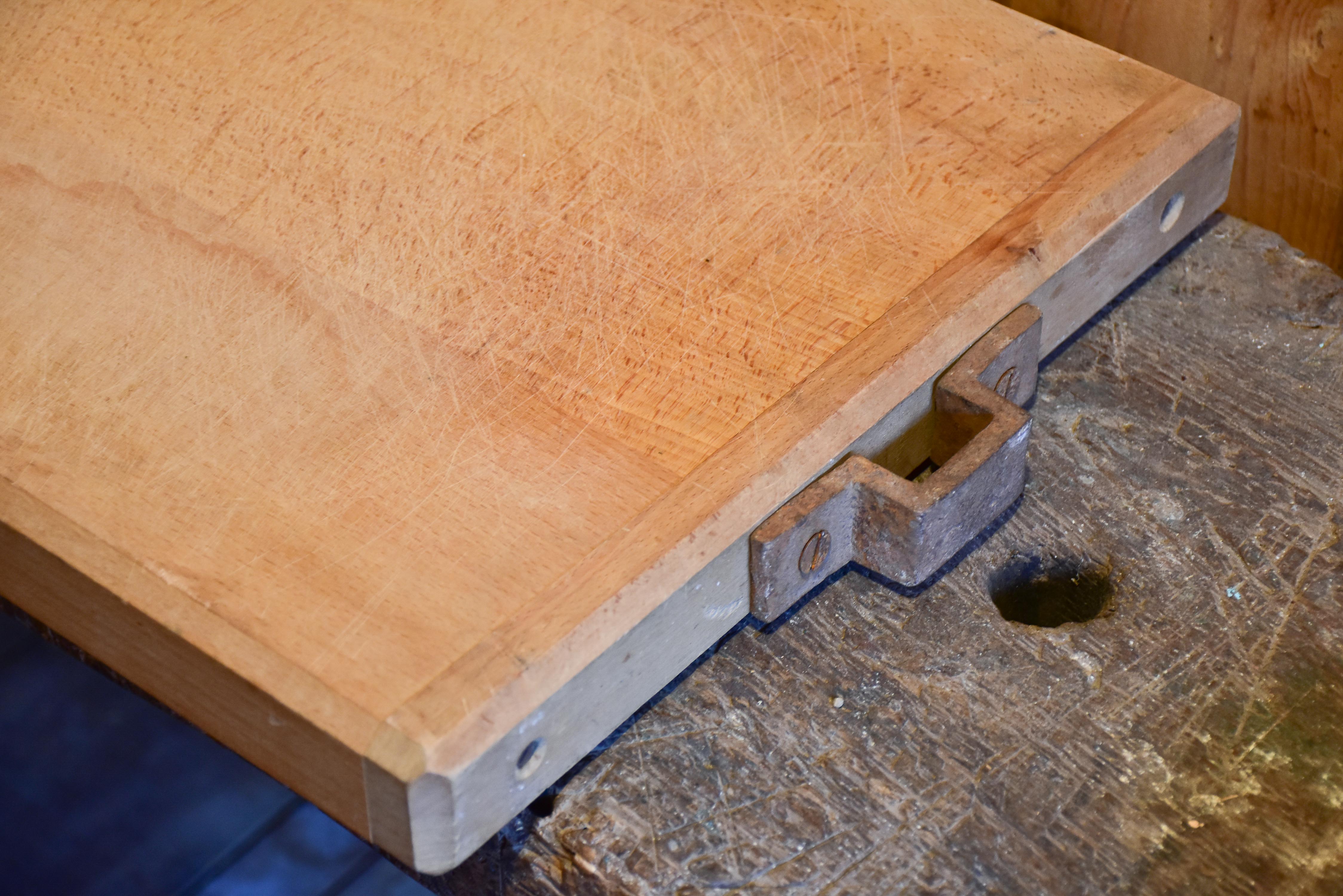 Very large vintage French cutting board with iron handle