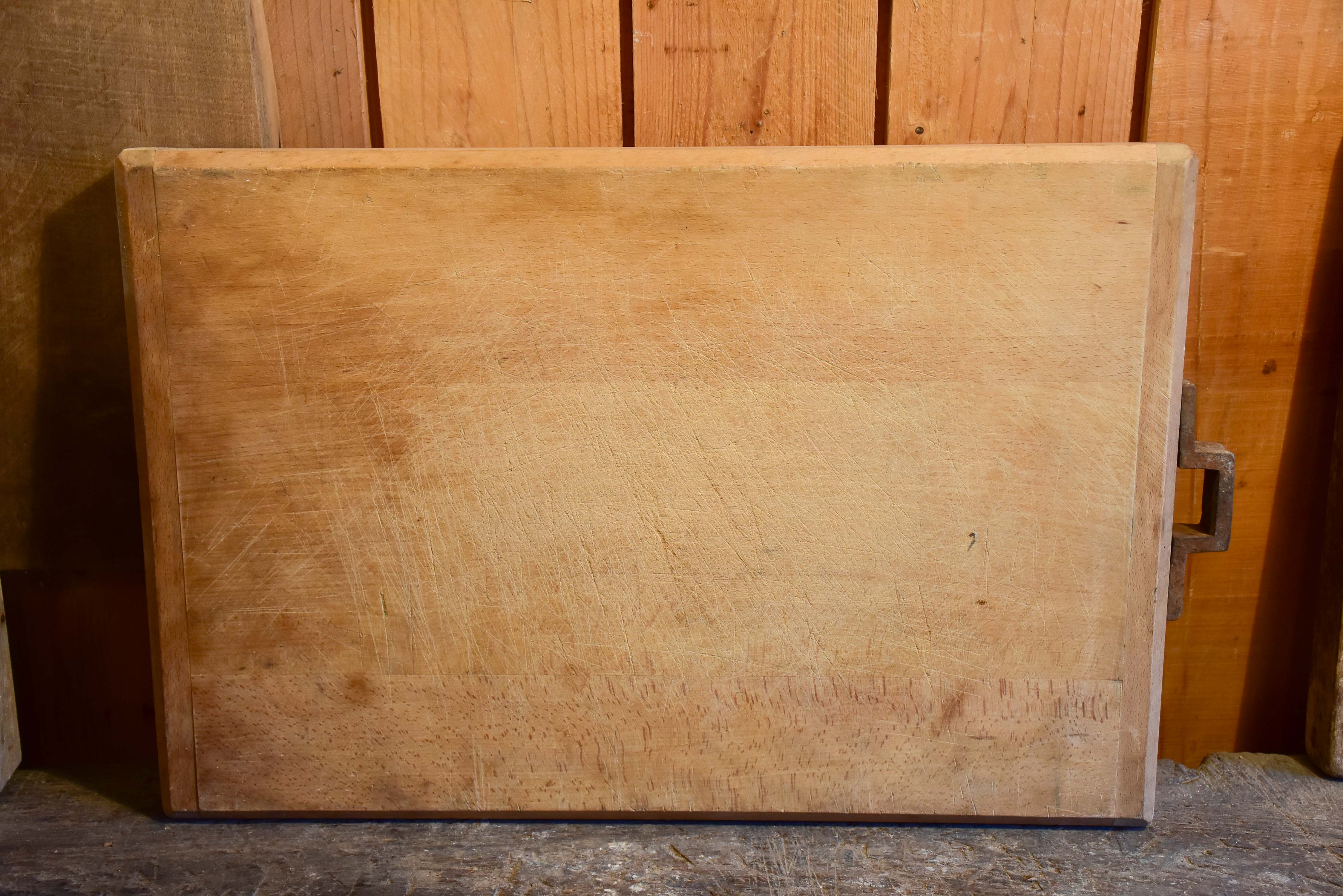 Very large vintage French cutting board with iron handle