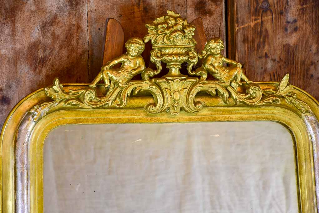 Antique French Louis Philippe mirror with angel crest 28 ¼" x 45 ¾"