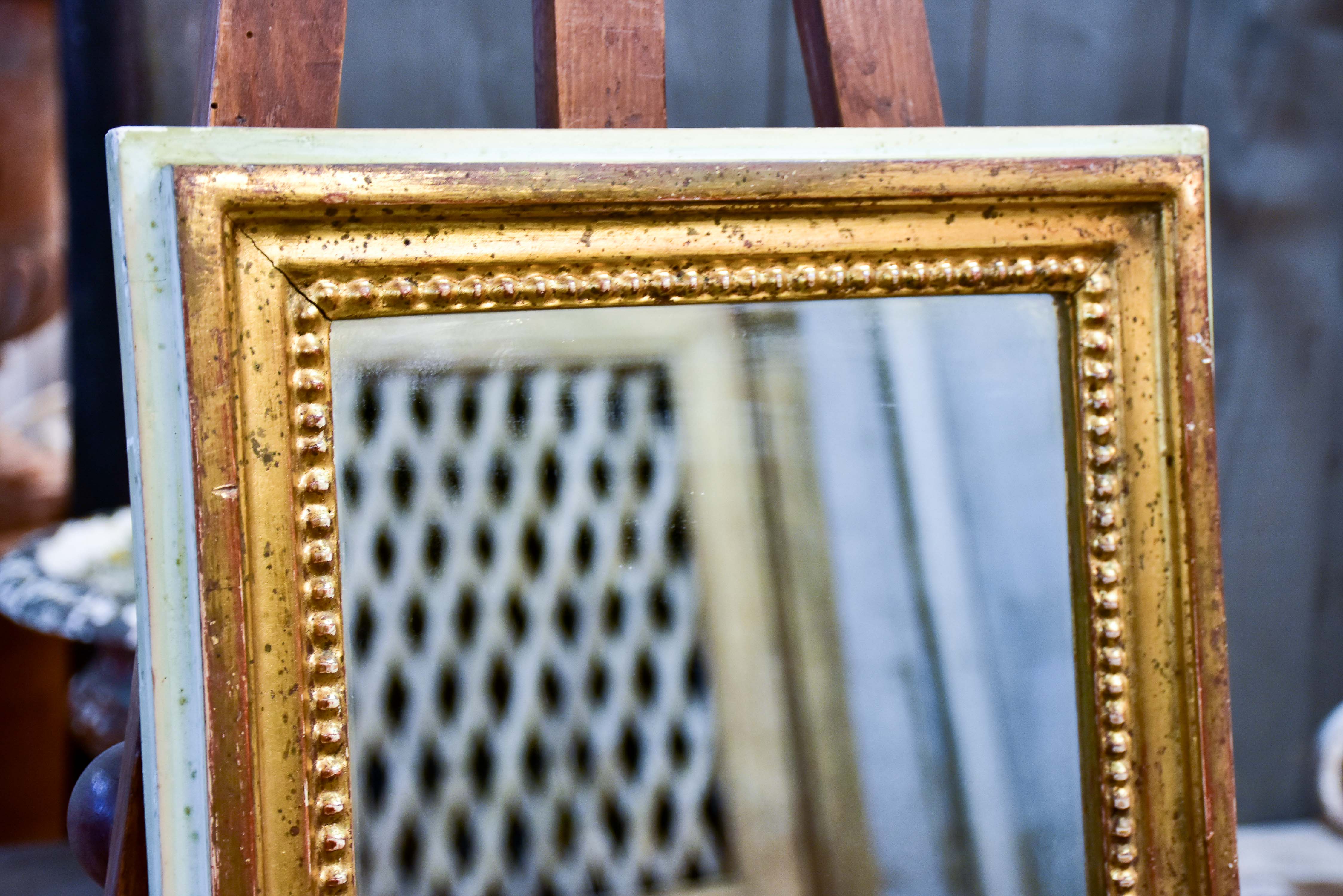 Narrow rectangular Louis Philippe mirror with gilded and sage green frame