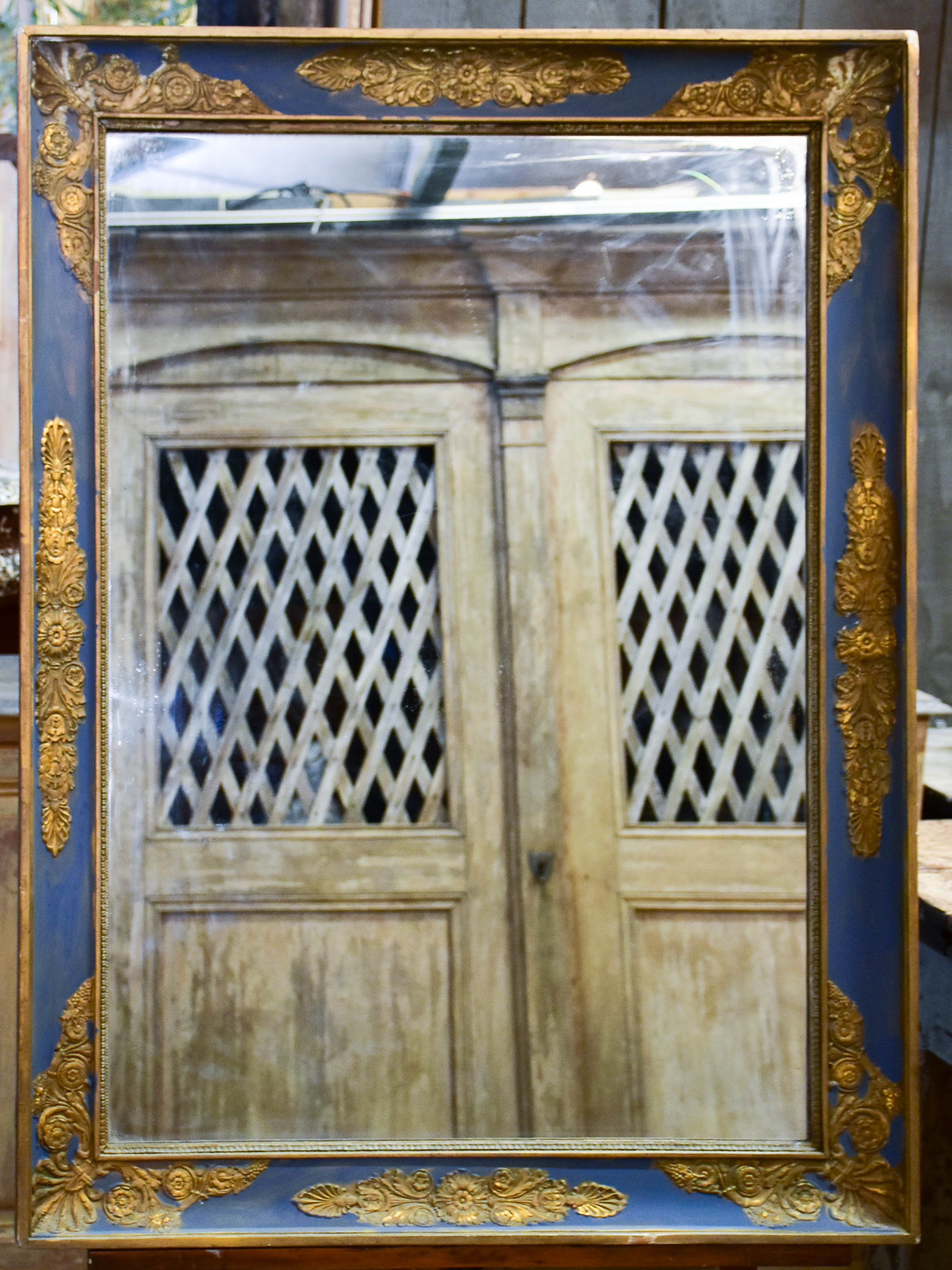 Large antique restoration mirror with blue and gold frame