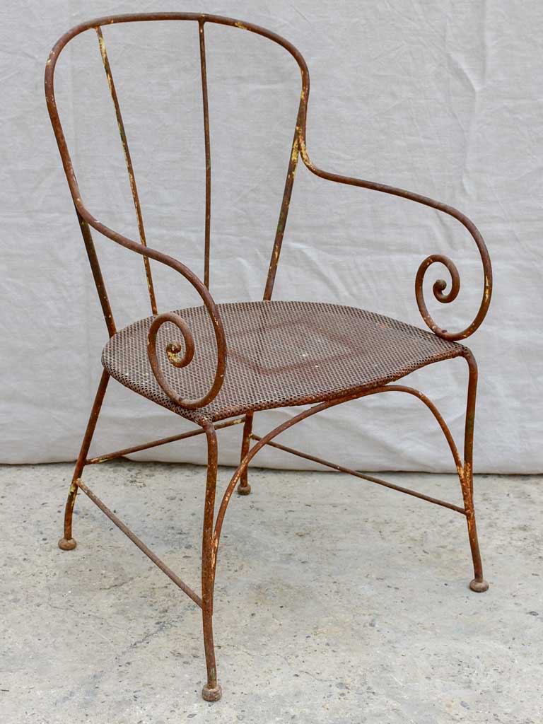Antique French garden armchair with bar backrest and perforated seat