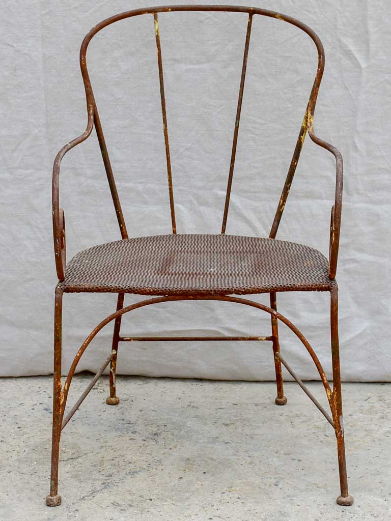 Antique French garden armchair with bar backrest and perforated seat