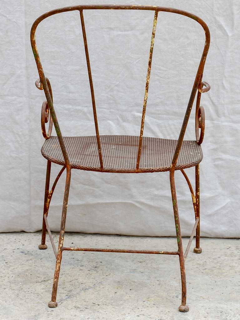 Antique French garden armchair with bar backrest and perforated seat