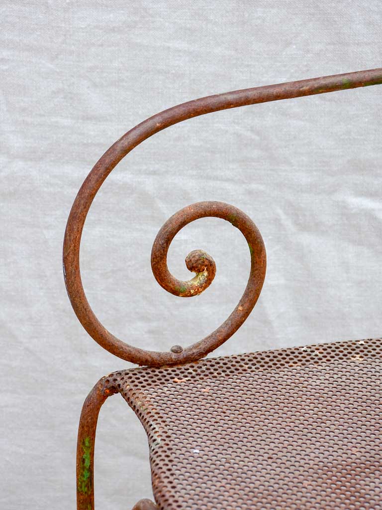 Antique French garden armchair with bar backrest and perforated seat