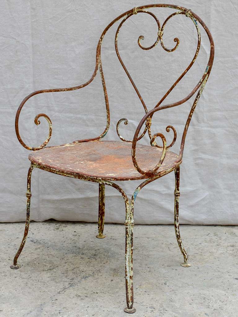 Collection of four antique French garden armchairs