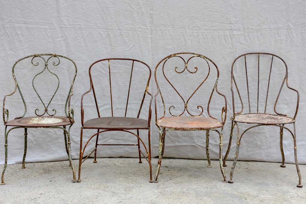 Collection of four antique French garden armchairs