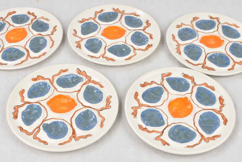 Set of 11+1 handpainted oyster plates - Calypso