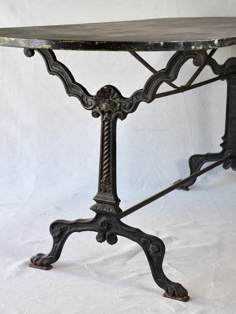 Vintage French oval table with cast-iron base 70¾" x 26¾"