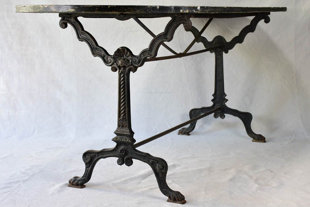 Vintage French oval table with cast-iron base 70¾" x 26¾"