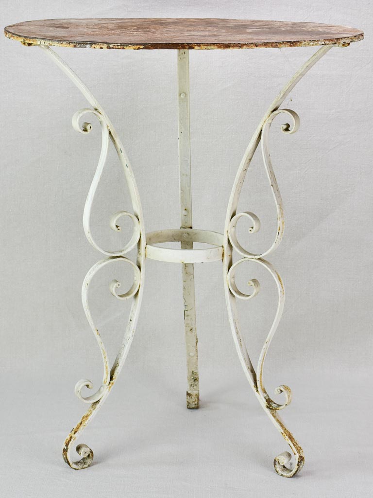 Mid century French garden table with pretty base and thick iron top