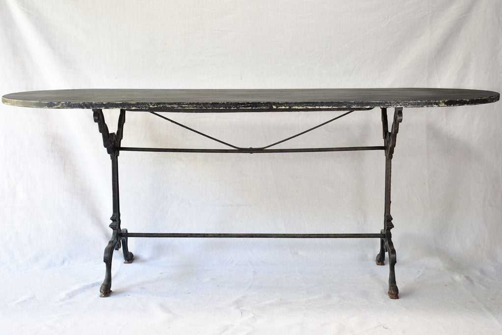 Vintage French oval table with cast-iron base 70¾" x 26¾"