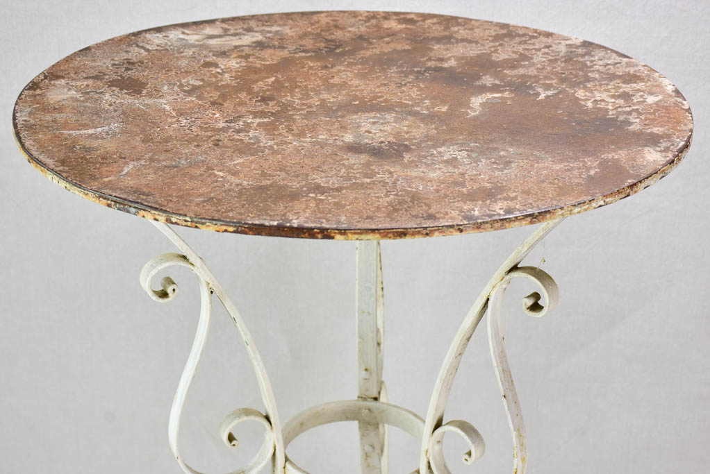 Mid century French garden table with pretty base and thick iron top