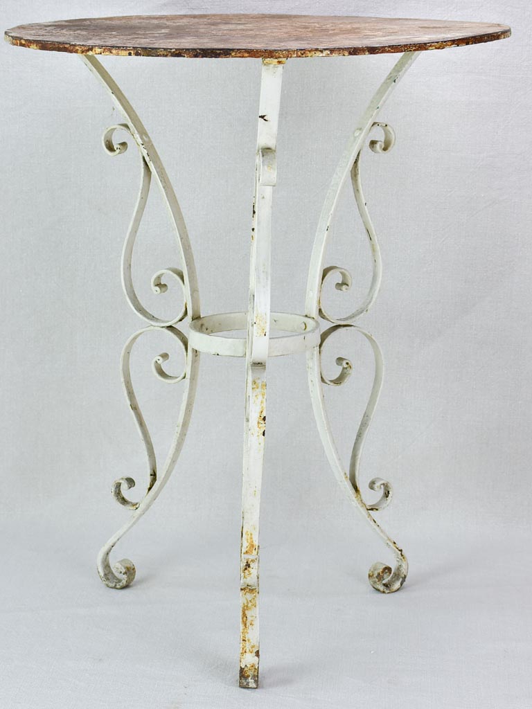 Mid century French garden table with pretty base and thick iron top
