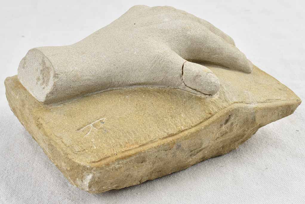 Antique-look, stone hand sculpture