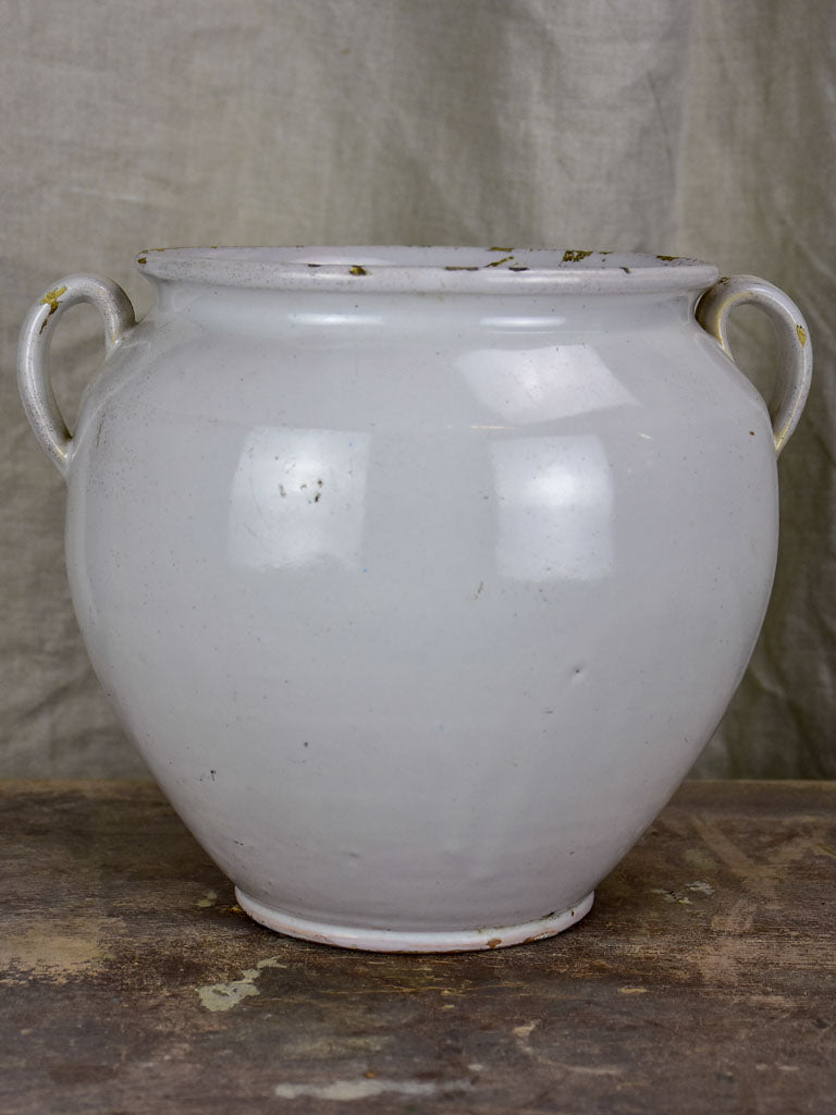Antique French preserving pot with white glaze and two handles