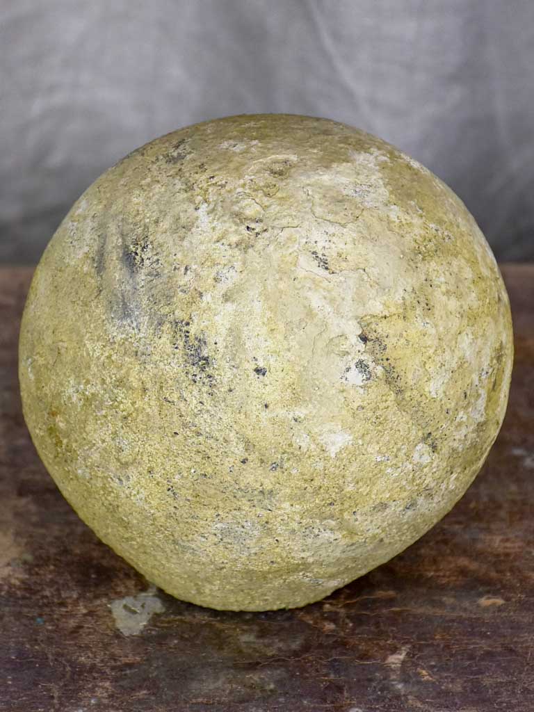 Round antique stone garden accent