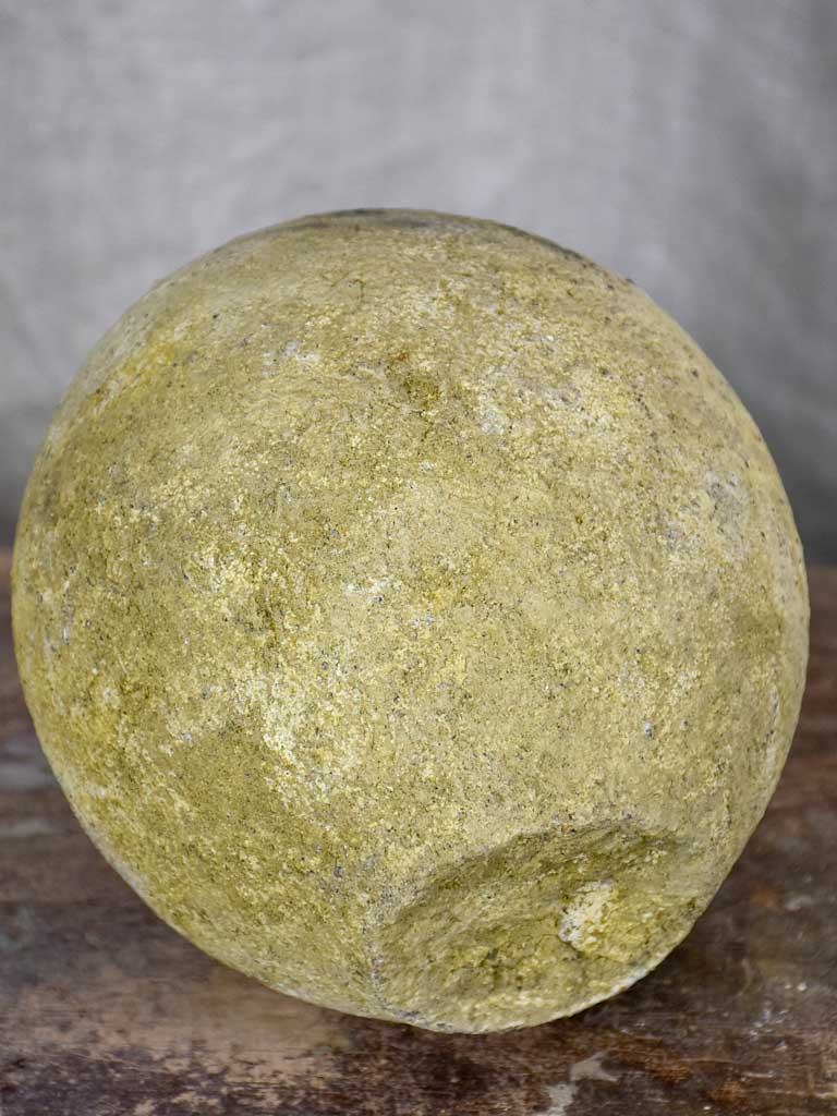 Round antique stone garden accent