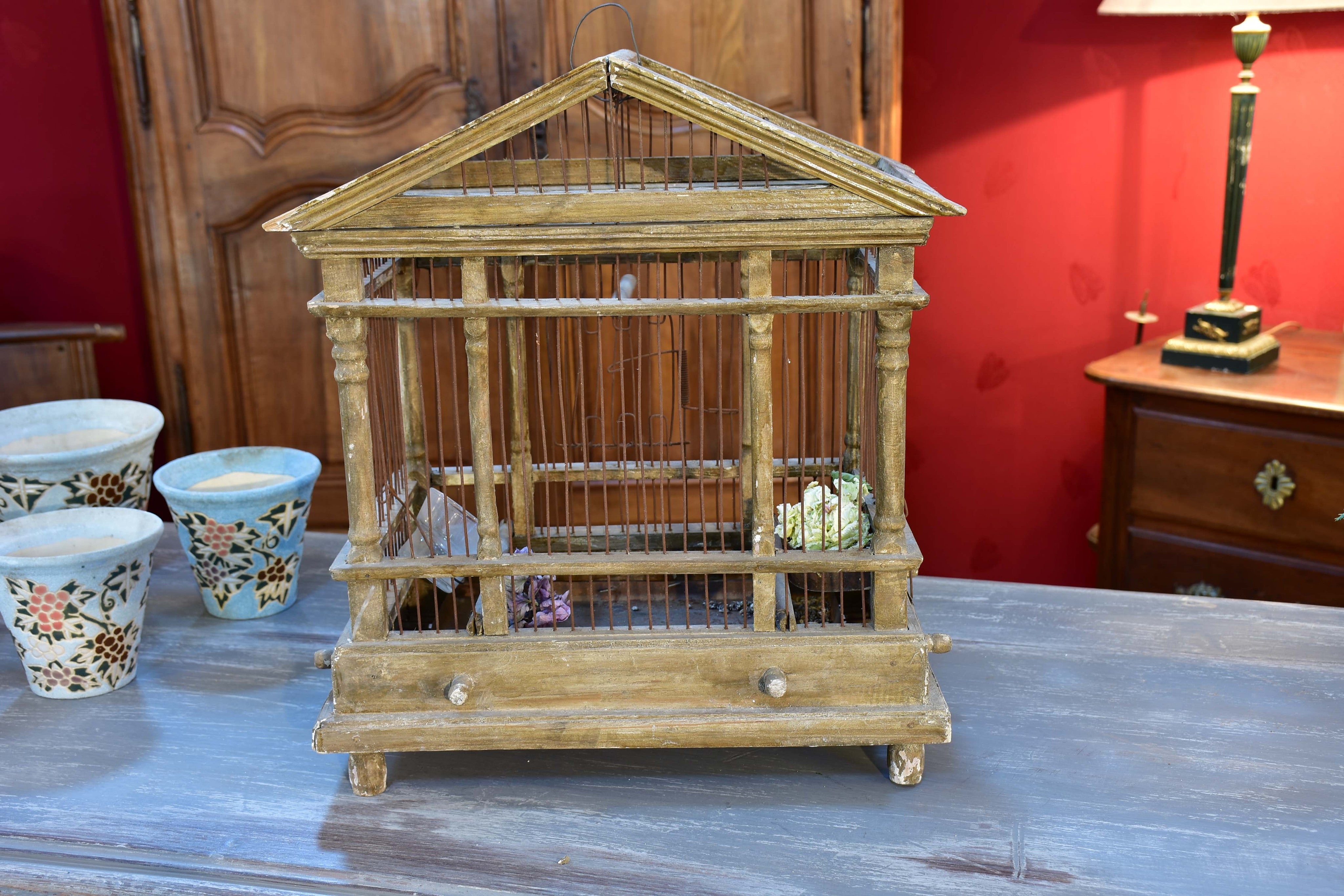 Antique French birdcage with pitched roof