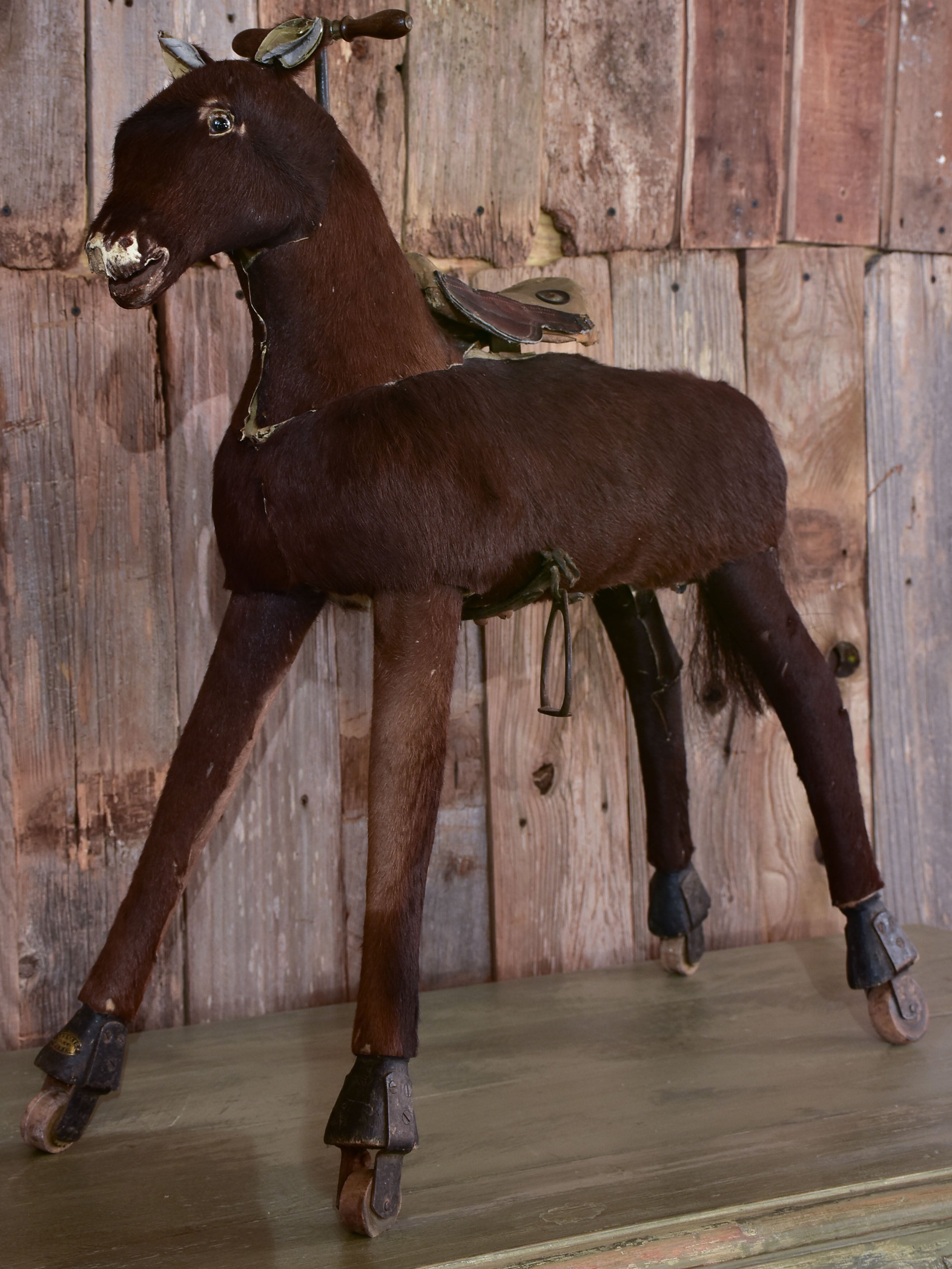 Antique French toy horse with moving mechanism