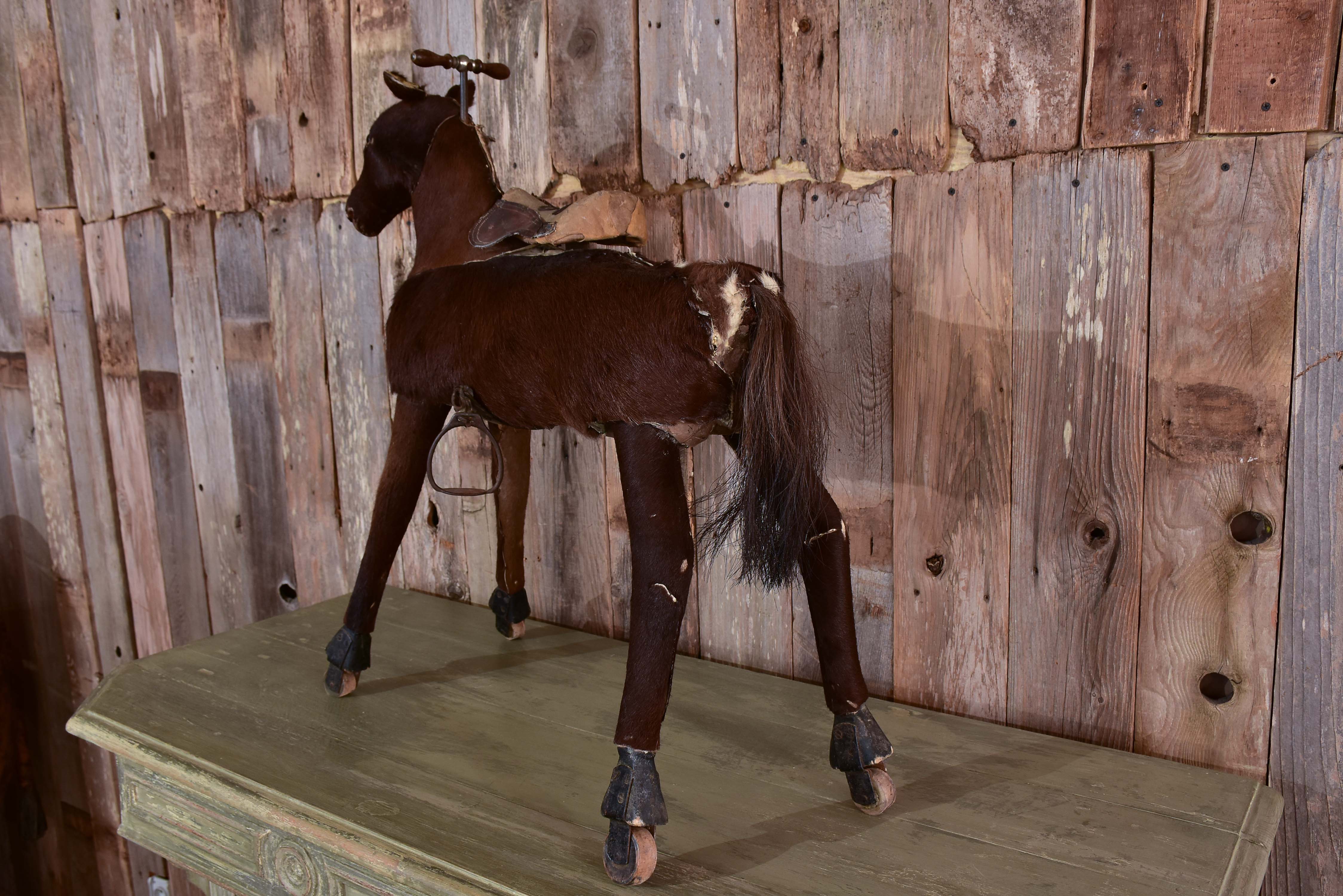 Antique French toy horse with moving mechanism
