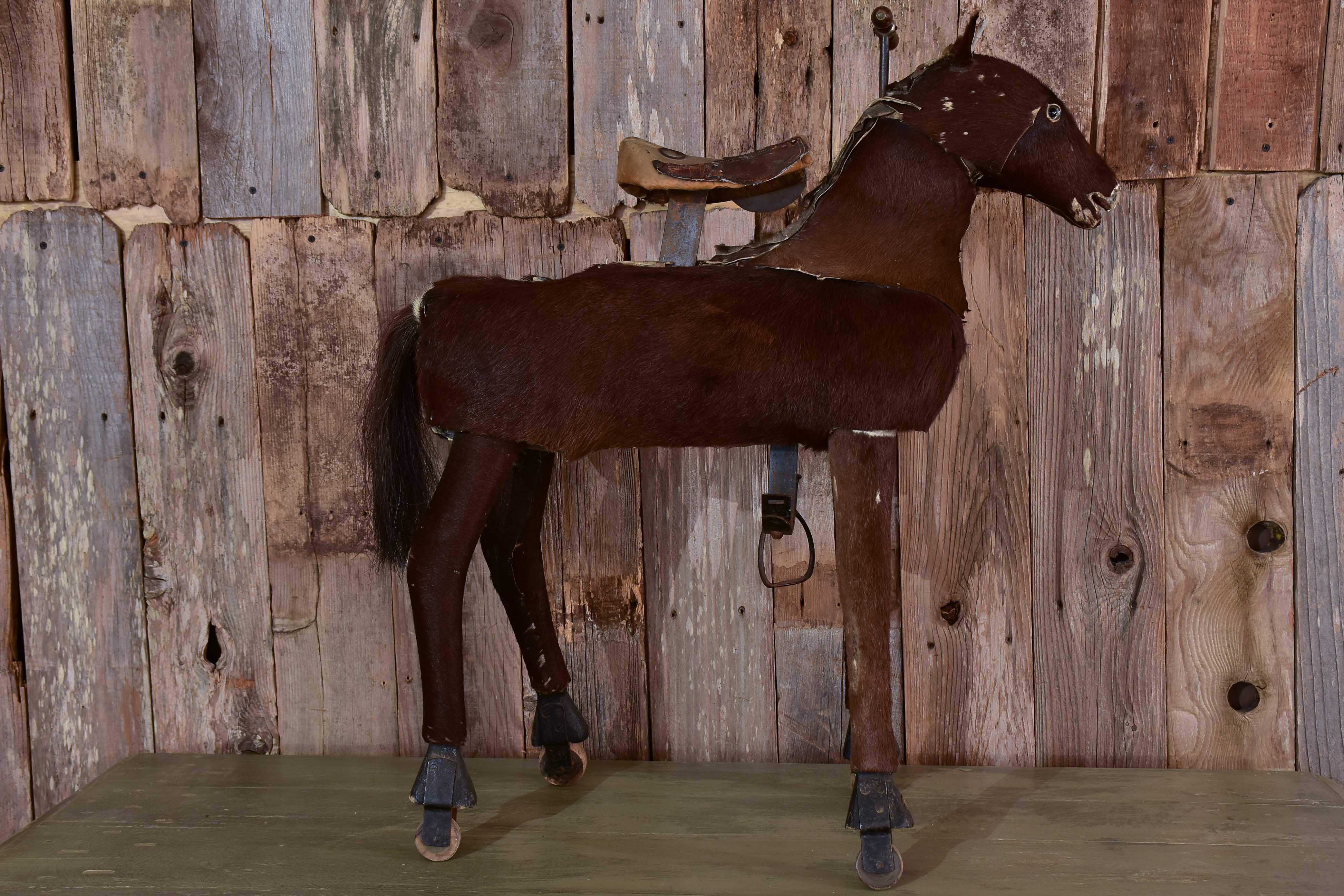 Antique French toy horse with moving mechanism