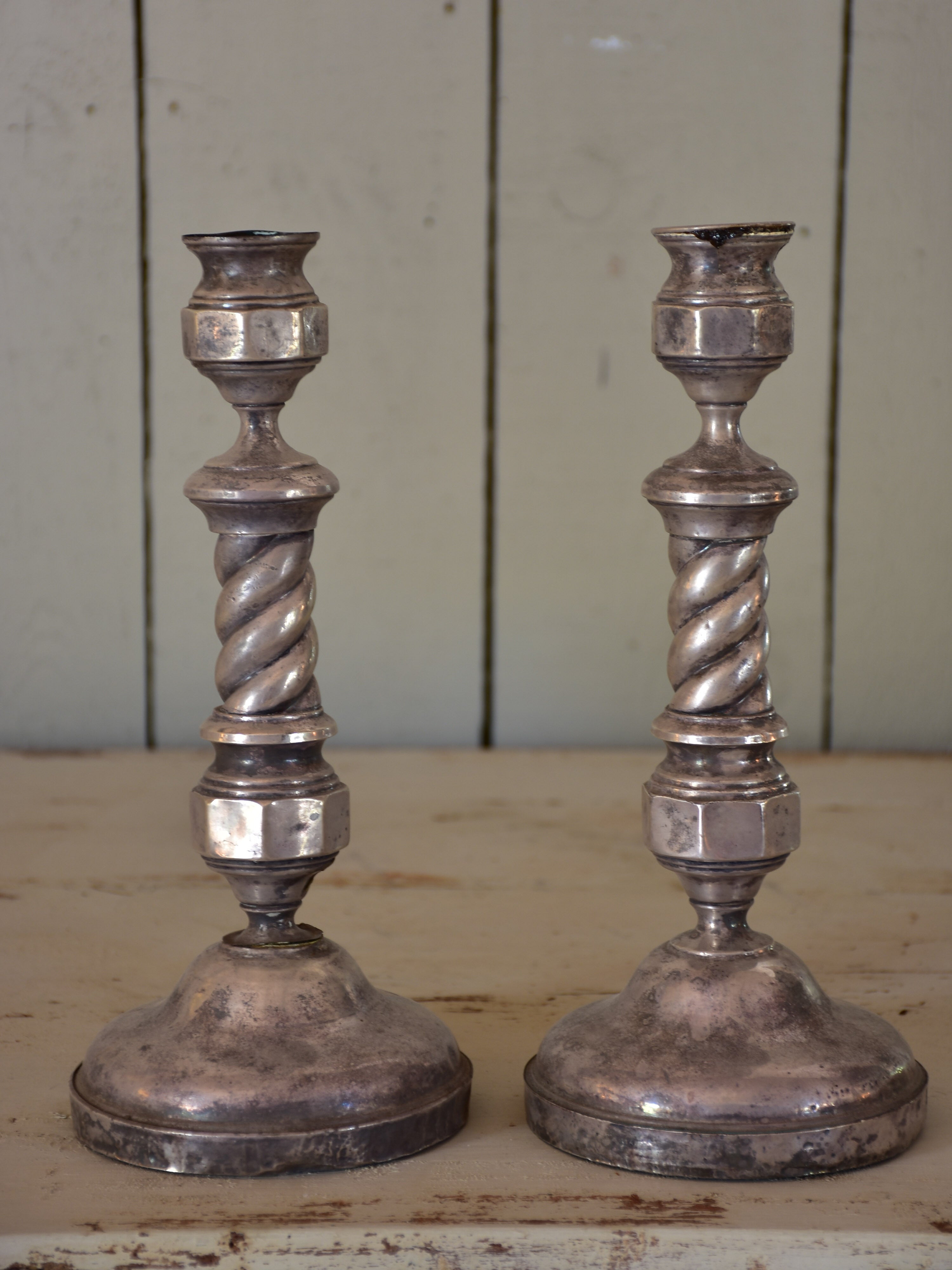 Pair of Louis XIV silver plated candlesticks