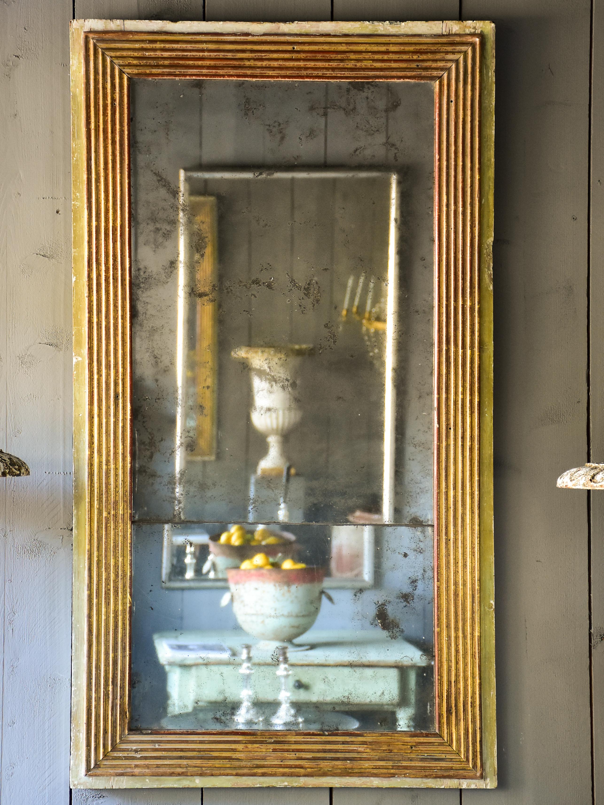 Late 18th century Louis XVI mirror with paneled glass