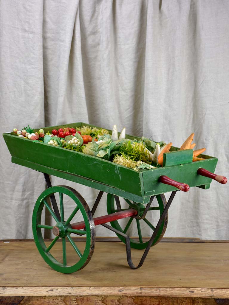French children's toy wheelbarrow with handmade fruit and vegetables
