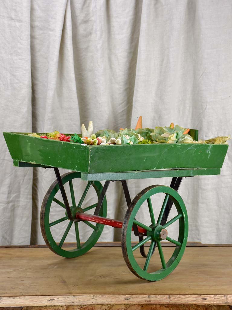 French children's toy wheelbarrow with handmade fruit and vegetables