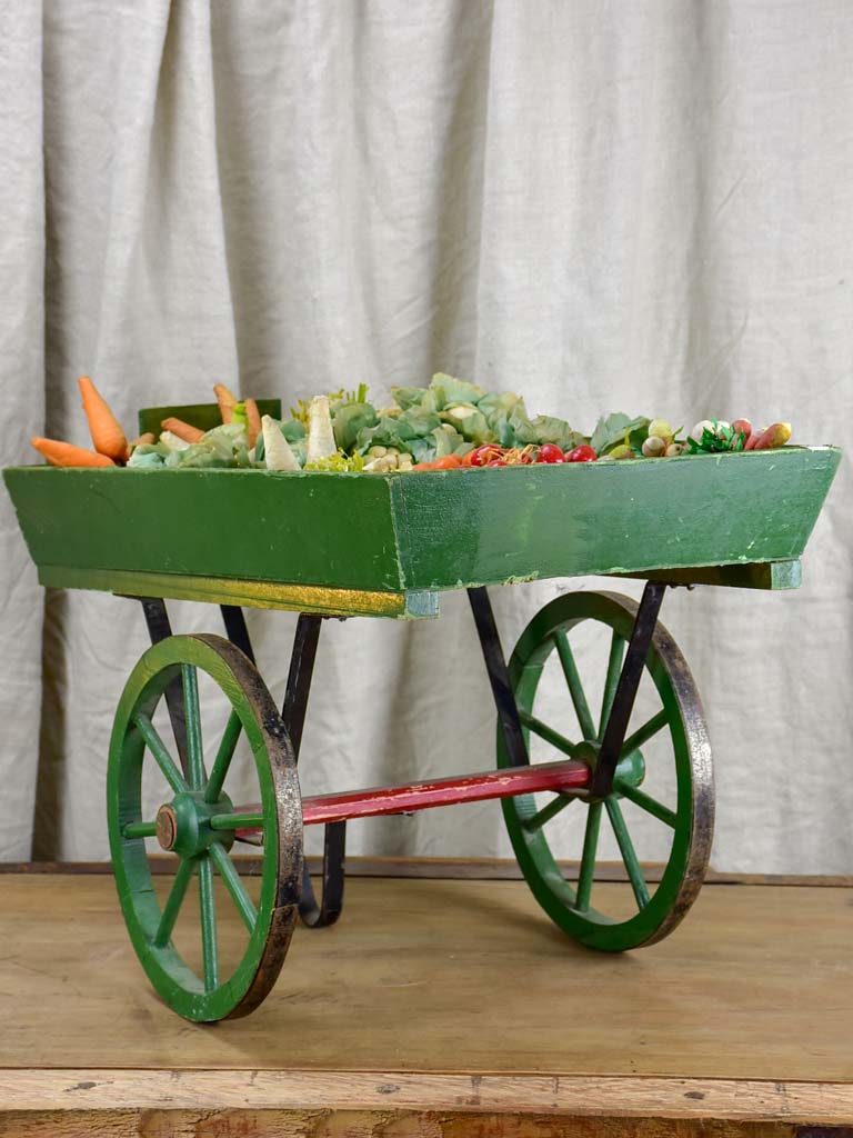 French children's toy wheelbarrow with handmade fruit and vegetables