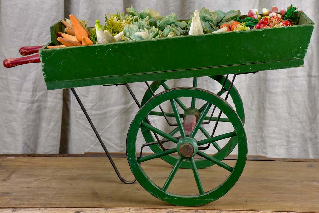 French children's toy wheelbarrow with handmade fruit and vegetables