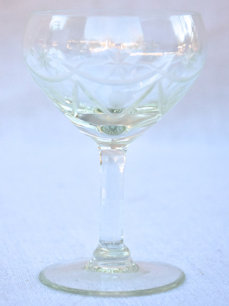 Set of antique French crystal wine and digestif glasses with pretty engravings