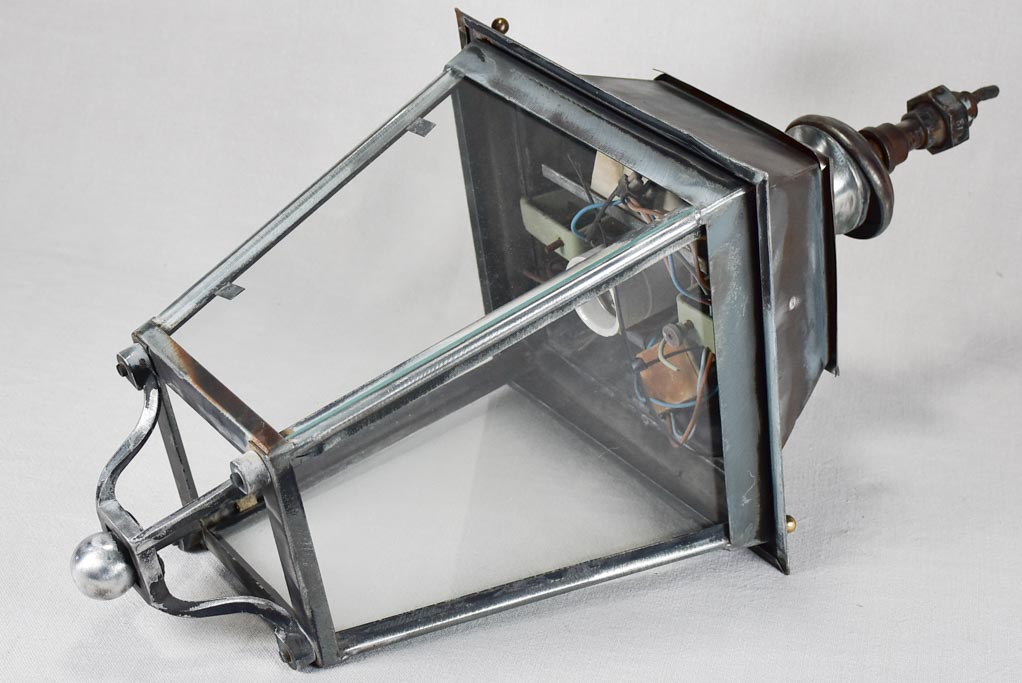 Antique lantern requiring local electrical adaptation