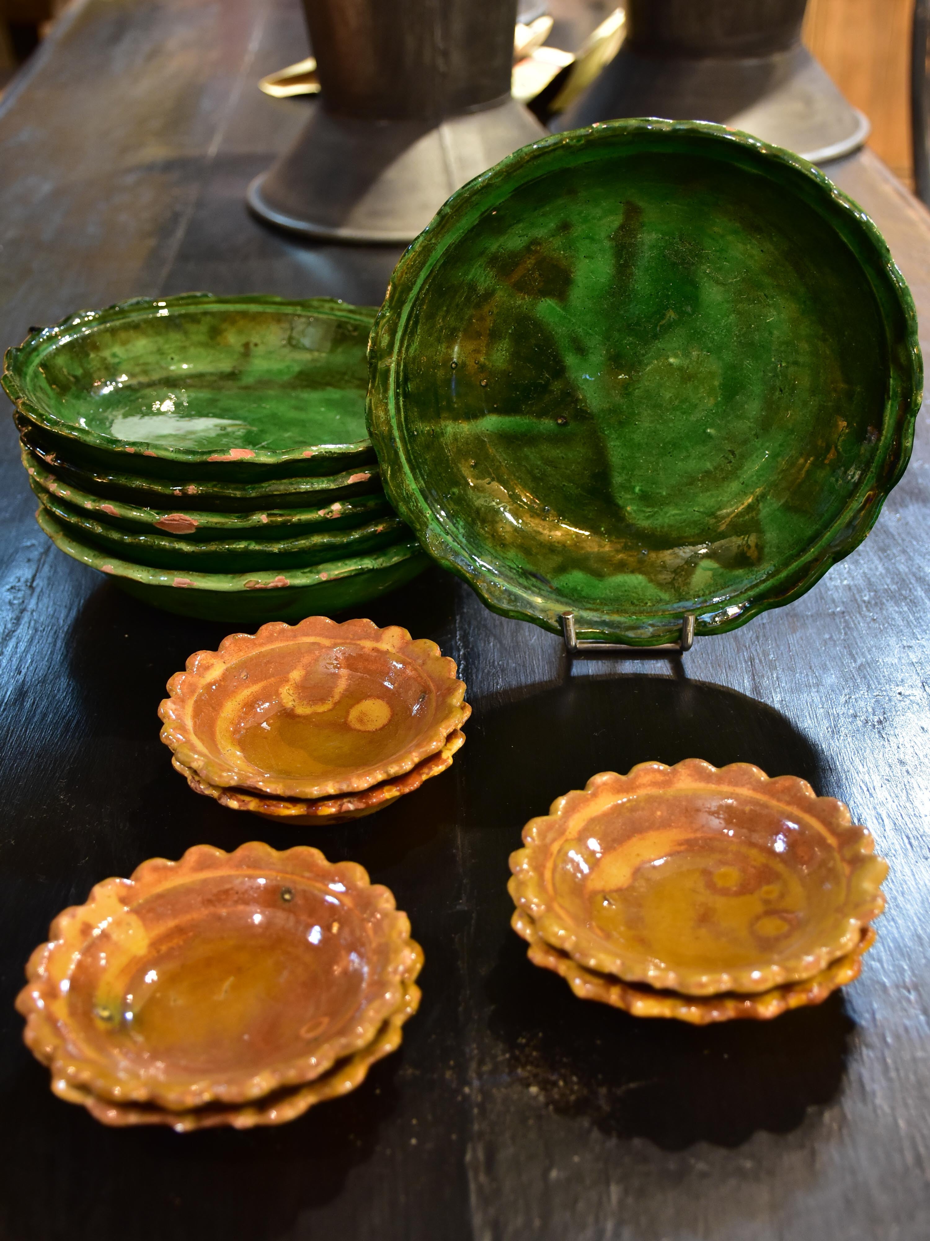 Set of six green glazed Provencal earthenware plates