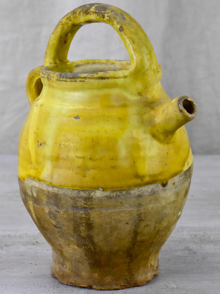 Late 19th Century French water pitcher with yellow glaze