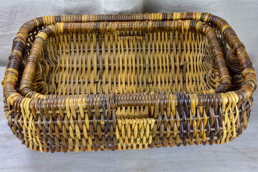Two vintage French baskets from a boulangerie