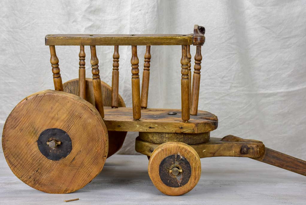 Antique French wooden toy chariot for girls
