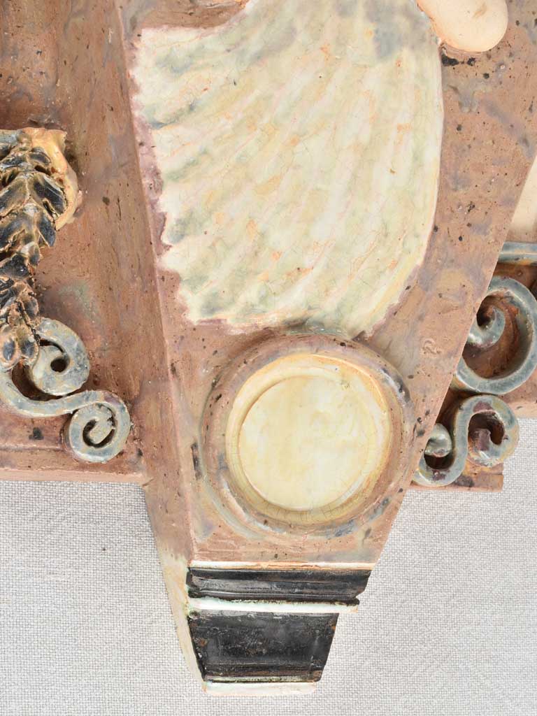 Angelic drinking figure wall console