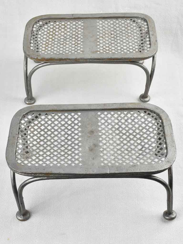 Pair of antique wrought iron garden footrests 12½"