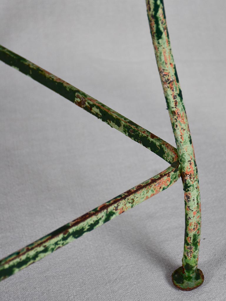 Pair of rustic French garden chairs with green patina
