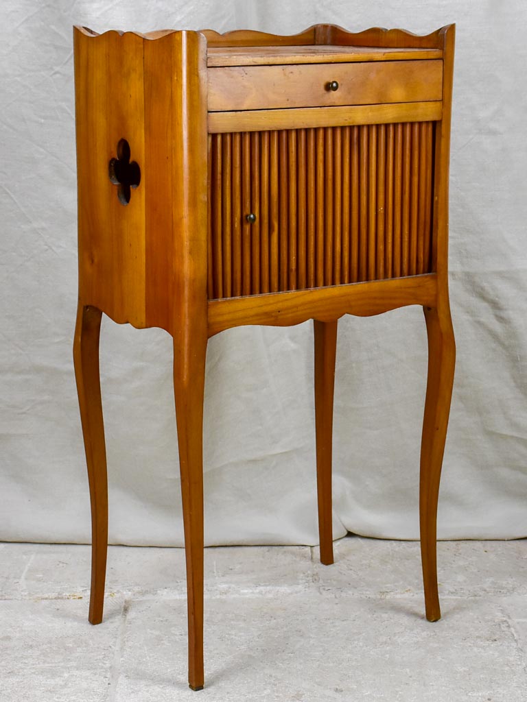 Mid century French nightstand in cherry wood with concertina door