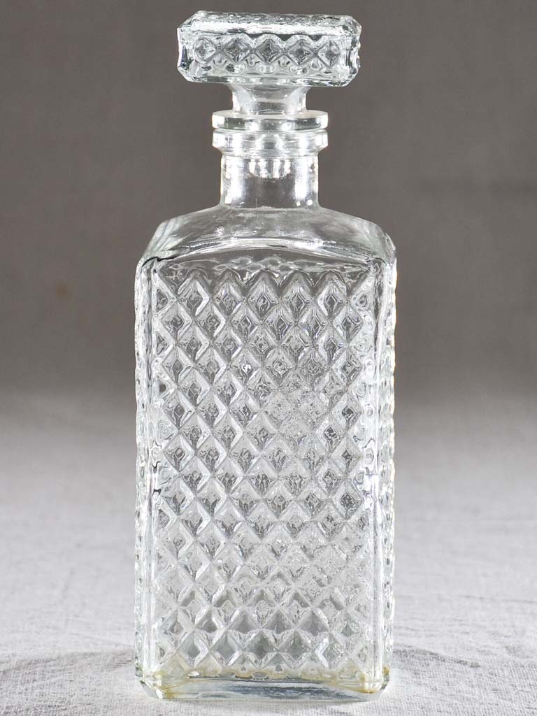 Vintage French whisky decanter with lattice pattern