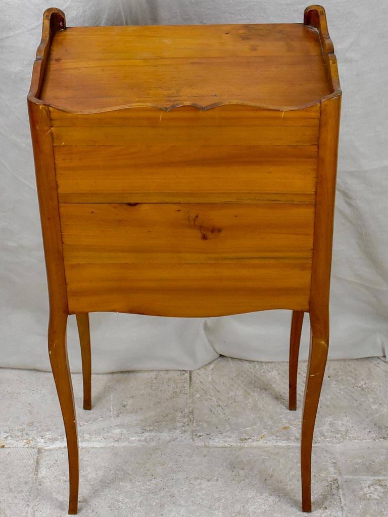 Mid century French nightstand in cherry wood with concertina door