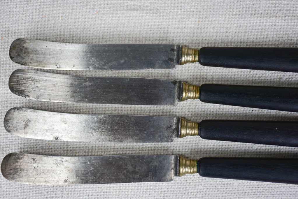 Collection of antique French knives with black handles
