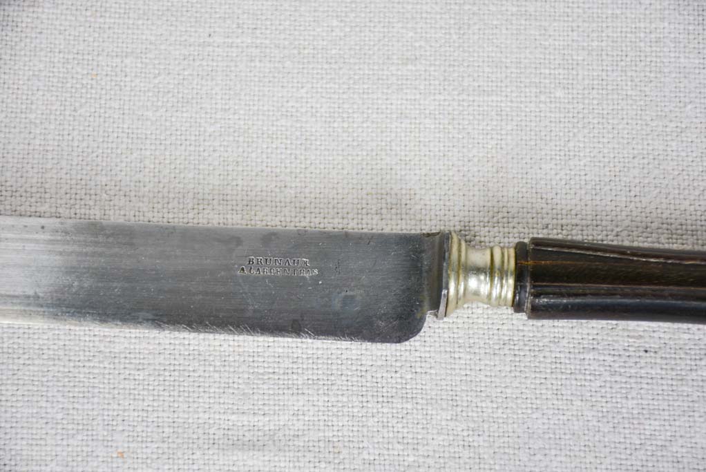 Collection of antique French knives with black handles