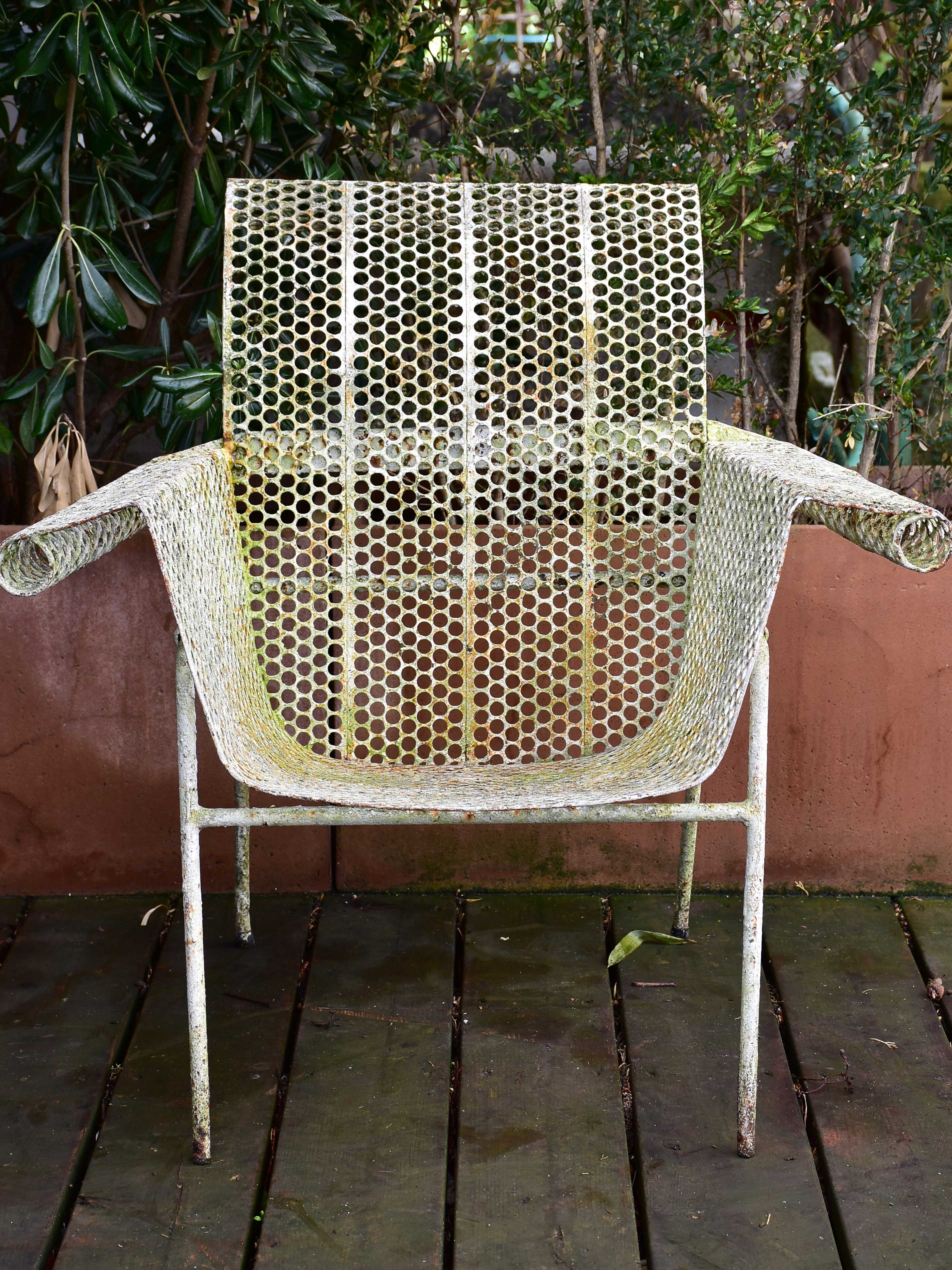 Five garden armchairs attributed to Malaval